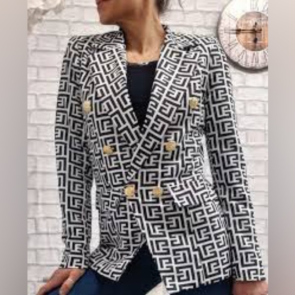 Fashion classic. Designer double-breasted women's jacket size - XL. With gold bu